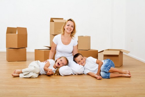 Packing and loading preparation for a Battersea move with boxes and furniture