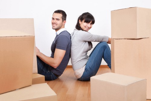 Furniture being carried from a Battersea apartment building